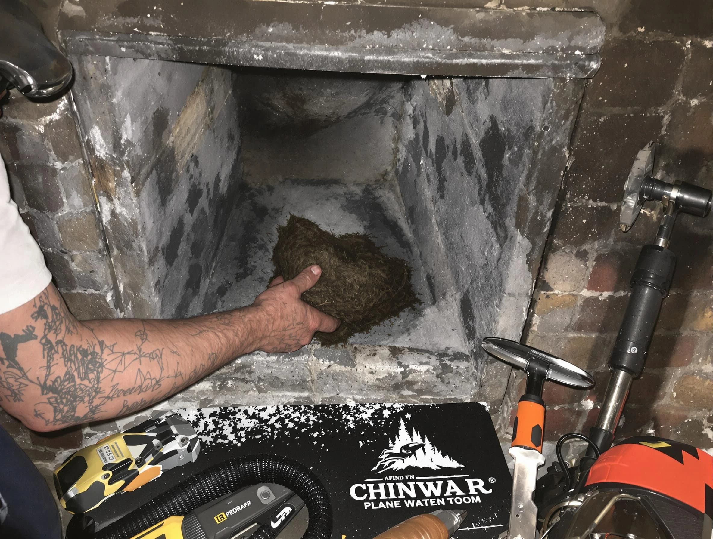 Kearny Chimney Sweep safely removing debris and screening chimney in Kearny, NJ